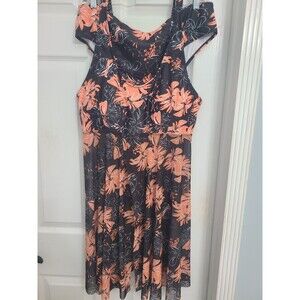 black two-piece swimdress with a peach/coral and white floral pattern. 3XL
